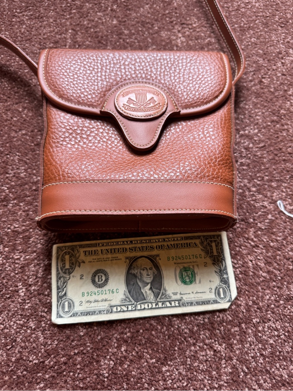 Brown Leather Crossbody Bag with Crest Emblem